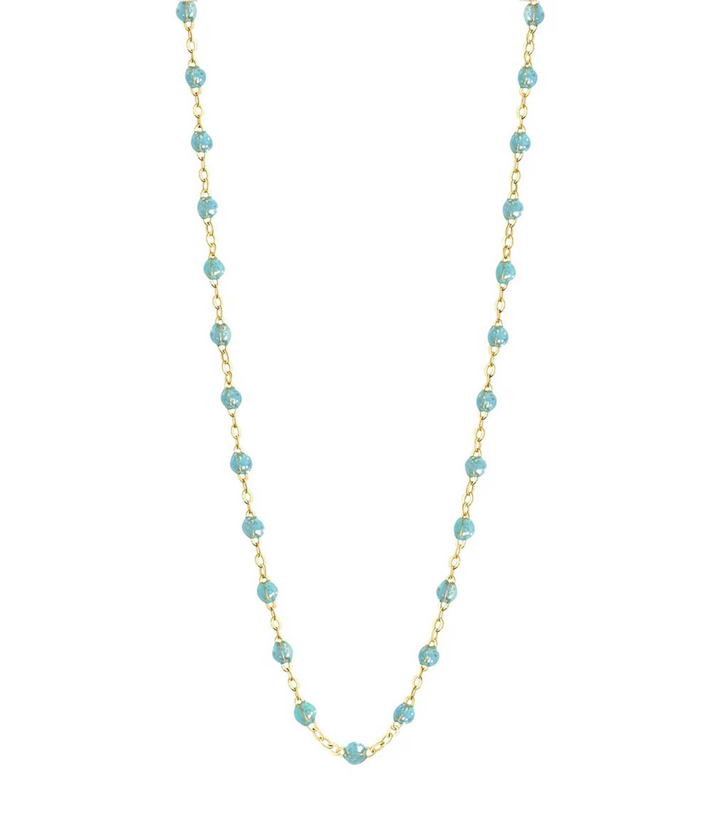 Collier or jaune et perles de résine 42 cm Gigi Clozeau Collier or jaune et perles de résine 42 cm Gigi Clozeau
