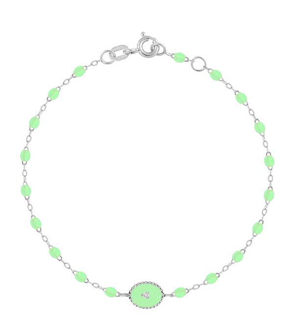 Bracelet or gris, perles de résine et médaille étoile du nord Gigi Clozeau